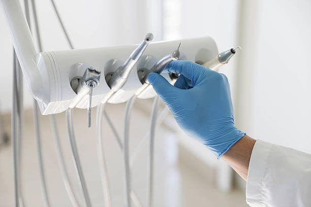 Professional Tooth Extraction technician working in Port Charlotte, FL